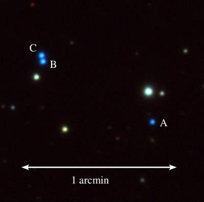 Discovery of the first resolved triple white dwarf